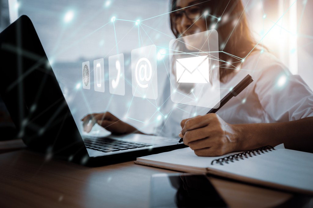 woman using laptop, searching web, browsing information, contact, having workplace at home. concept contact us